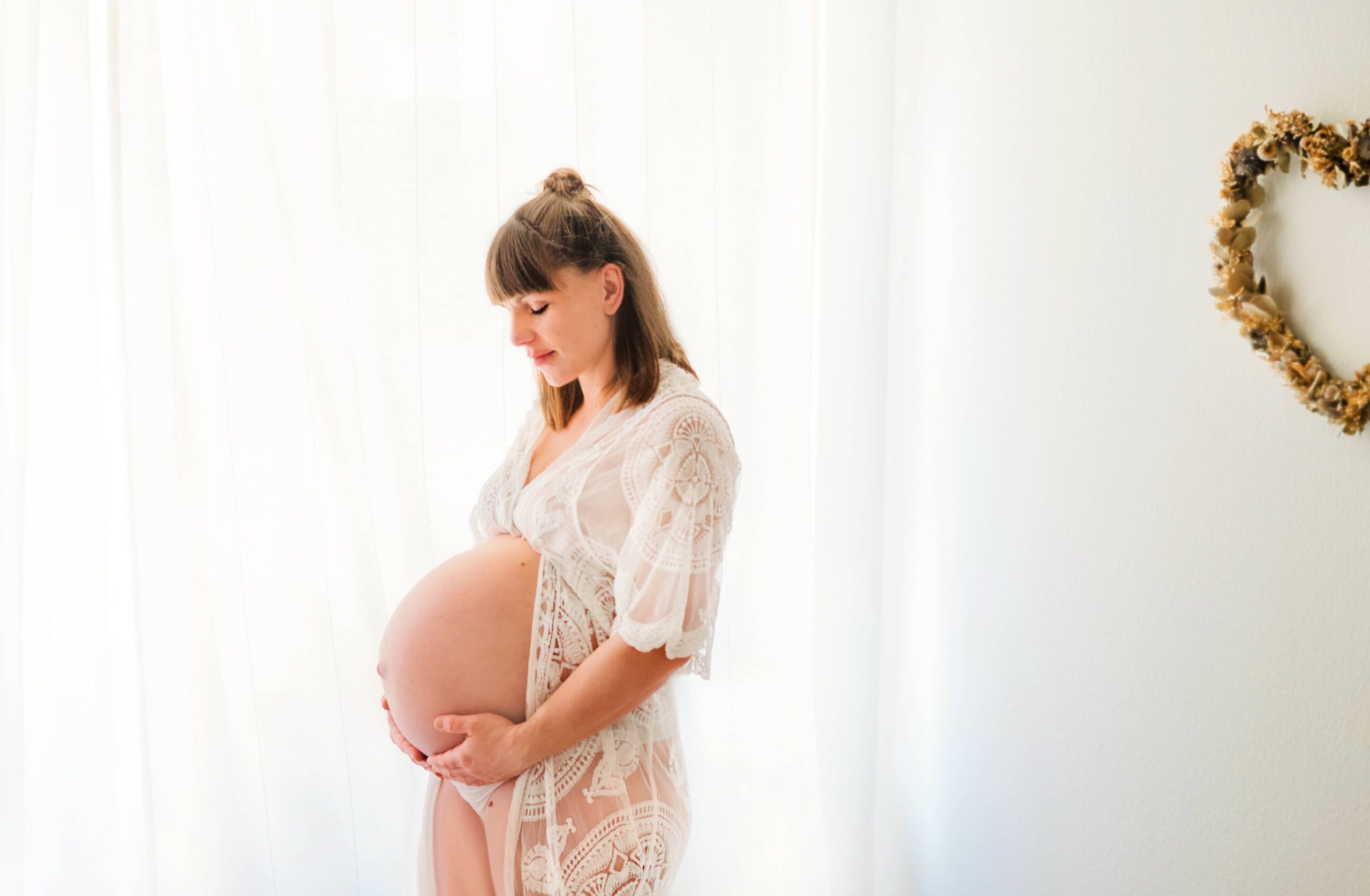 An expectant mother in the photography studio